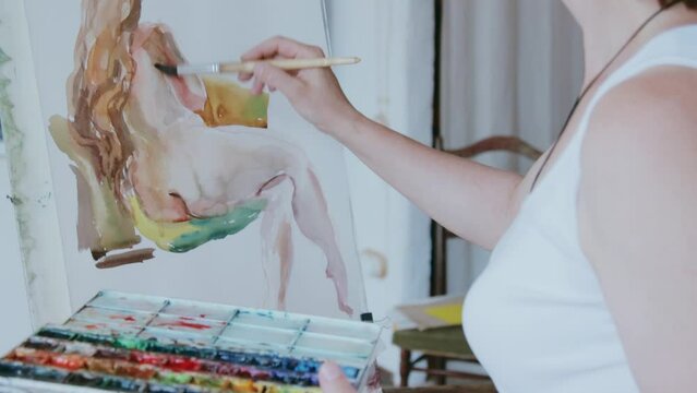 An artist at work in her studio
