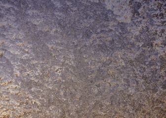 Frosty patterns on the window glass.