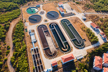 Water cleaning facility at wastewater treatment plant. Purification process of removing undesirable chemicals, suspended solids from grey water © Leonid
