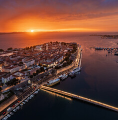 Zadar, Croatia - Aerial panoramic view of the old town of Zadar with colorful dramatic sunset sky,...