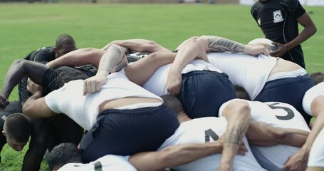 Group, rugby men and scrum with sports, contest and power for territory, field and grass with support. Team, push and huddle for ball, game or competition at stadium, park or outdoor for tournament