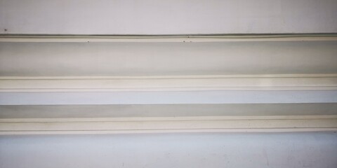 Fototapeta premium Stucco walls, Thai pattern, natural colors, three-dimensional horizontal lines, layered together.