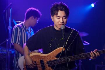 Young band performing on stage