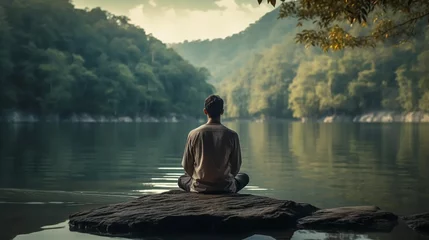 Fototapeten Man relaxing in nature, meditation, relaxation, spiritual harmony © PhotoHunter