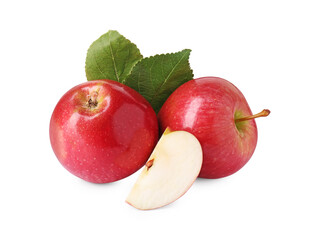 Whole, cut red apples and leaves isolated on white