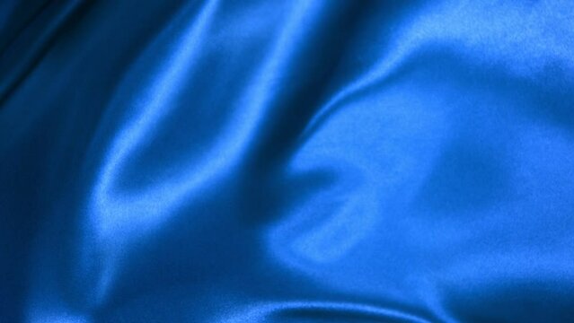 Super slow motion of waving blue velvet cloth in detail. Filmed on high speed cinema camera, 1000fps.