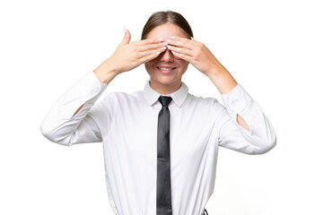 Young business caucasian woman over isolated background covering eyes by hands