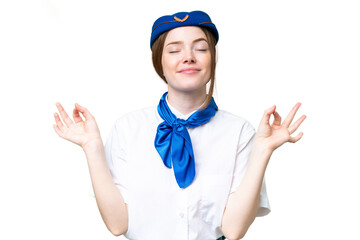 Airplane stewardess over isolated chroma key background in zen pose