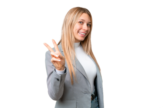 Young pretty blonde woman over isolated chroma key background smiling and showing victory sign