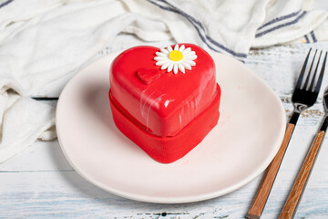 Heart cake. Heart shaped cake on wooden background