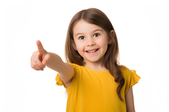 Portrait of a cute little girl pointing her finger to the side