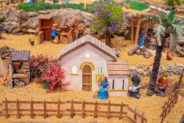 Human representation model on a reduced scale measuring approximately 10cm.