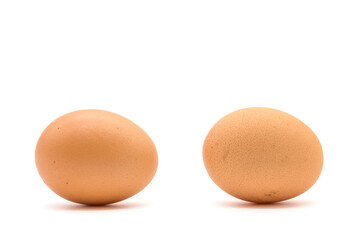Brown chicken eggs isolated on a white background