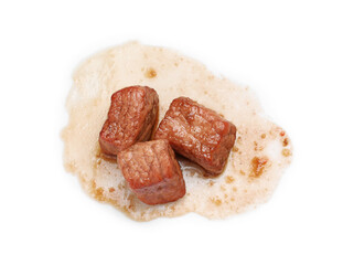 Pieces of delicious cooked beef isolated on white, top view. Tasty goulash