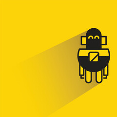 robot with shadow on yellow background