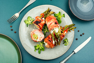 Beef meat rolls with young asparagus.