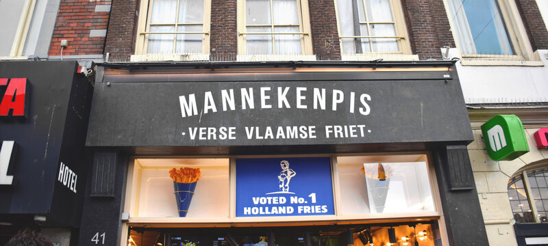 Amsterdam,  Netherlands - August 24, 2023; Image of popular Mannekenpis restaurant in Amsterdam, Netherlands that specializes in flernish fries.