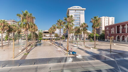 Panorama showing aerial view of the fountains and palms on the main square Sheshi Liria in Durres...
