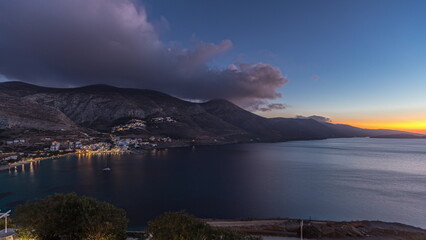 Panorama showing Amorgos island aerial day to night timelapse from above. Greece