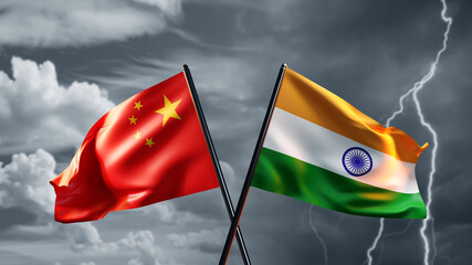 Flags of india and China. National symbols on flagpoles. State flags under stormy sky. Union of...
