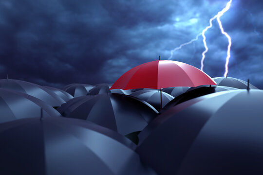 Red umbrella stands out among black ones. Dark sky with lightning. Concept non-standard thinking and individuality. Wallpaper with umbrellas. Background for motivation towards individuality. 3d image