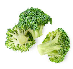 three broccoli inflorescences on a white isolated background, top view