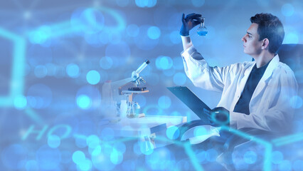 Man is chemist. Laboratory assistant holds test tube. Chemist sits at table with microscope and...