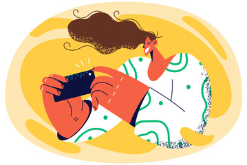 Smiling woman take selfie on smartphone