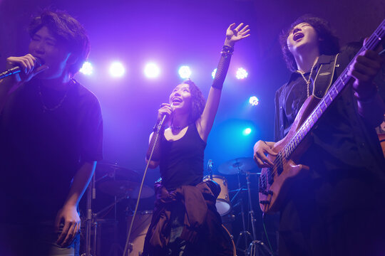 Young band performing on stage