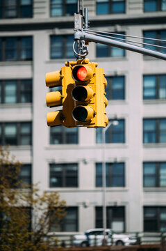 Yellow traffic light in Manhattan streetscape
