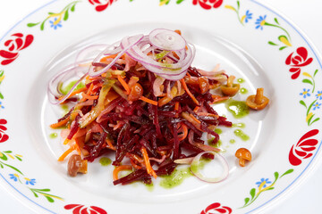 beetroot and cabbage salad on white plate