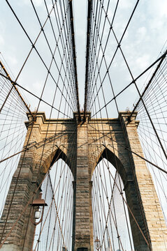 Iconic Brooklyn Bridge cables and pillars