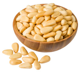 Roasted pine nuts in the wooden bowl,a isolated on the white background.