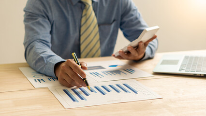 Accountant holding documents preparing performance analysis report Executives create documents at...