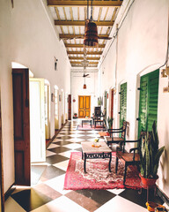 The sunny corridor at a palace in Sankpur, West Bengal, India in January 2023.... - obrazy, fototapety, plakaty