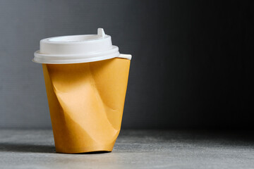 Crumpled paper cup for hot coffee and tea drinks.