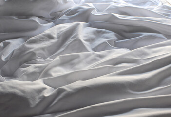 Abstract white fabric drapery background. Cloth soft wave.