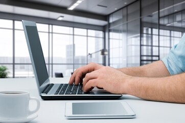 Fototapeta na wymiar Business worker using laptop in office