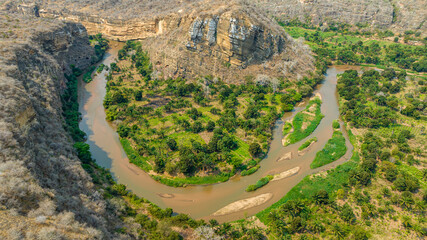 Aerial of the horseshoe bend of the Rio Cubal Canyon, Angola