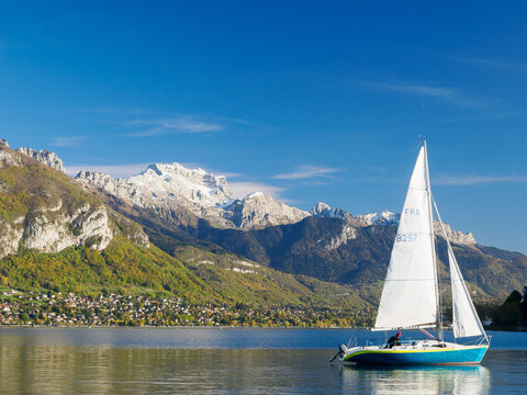 A sailboat on Lake Annecy on a beautiful late-fall day, Annecy, Haute-Savoie