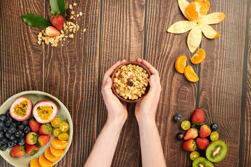 Person Holding Granola Bowl