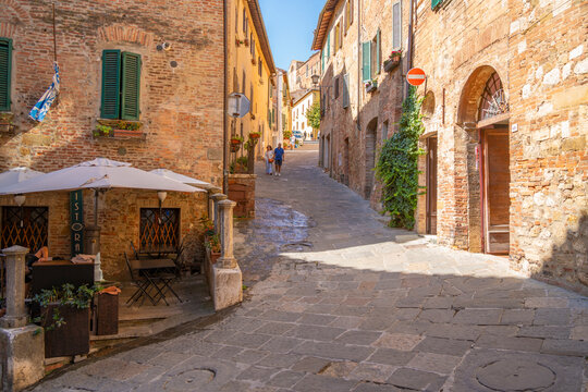 Fototapeta View of cafe and bar in narrow street in Montepulciano, Montepulciano, Province of Siena, Tuscany