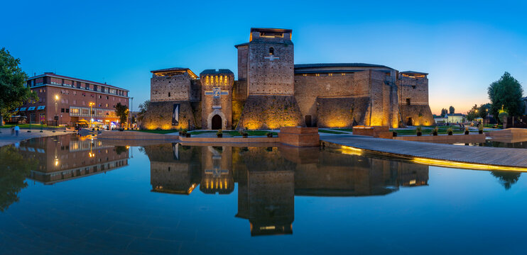 View of Castel Sismondo reflecting in ornamental water in Rimini at dusk, Rimini, Emilia-Romagna