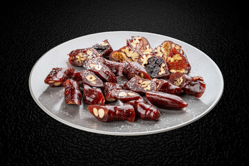 Rakhat lukum. A Middle Eastern sweet, laced with nuts or fruit juices. Isolated image