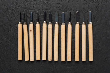 Carpenter tools on concrete background,top view