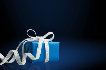 Luxury blue gift box with a bow