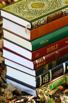 Books of the three monotheistic religions, Christianity, Islam and Judaism, the Torah, Quran and Bible, France