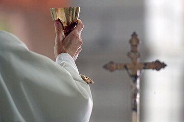 Catholic Priest, Eucharist celebration in church, Yonne