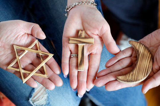 Christianity, Islam and Judaism, Bible, Quran and Torah, interreligious symbols, faith and spirituality concept