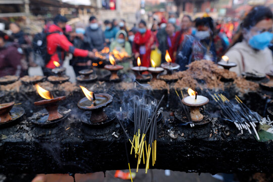 Oil (butter) lamps burning in Hindu temple, Kathmandu, Nepal